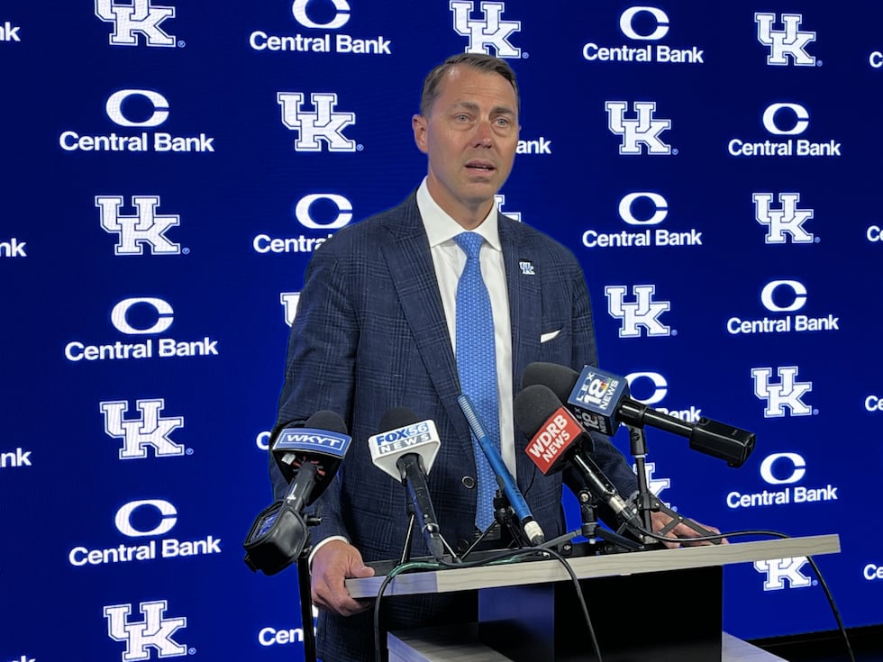 J Batt speaks at news conference after being named UK's new athletics director.