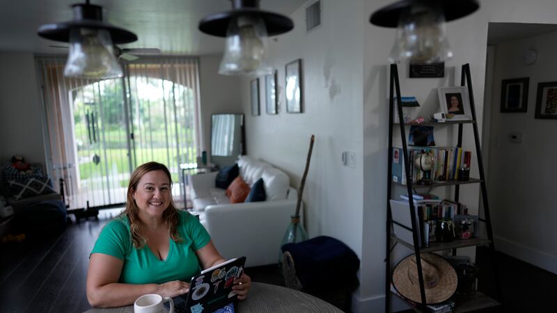 Melissa Lombana, 43, a high school teacher and mountain bike enthusiast, poses for a picture...