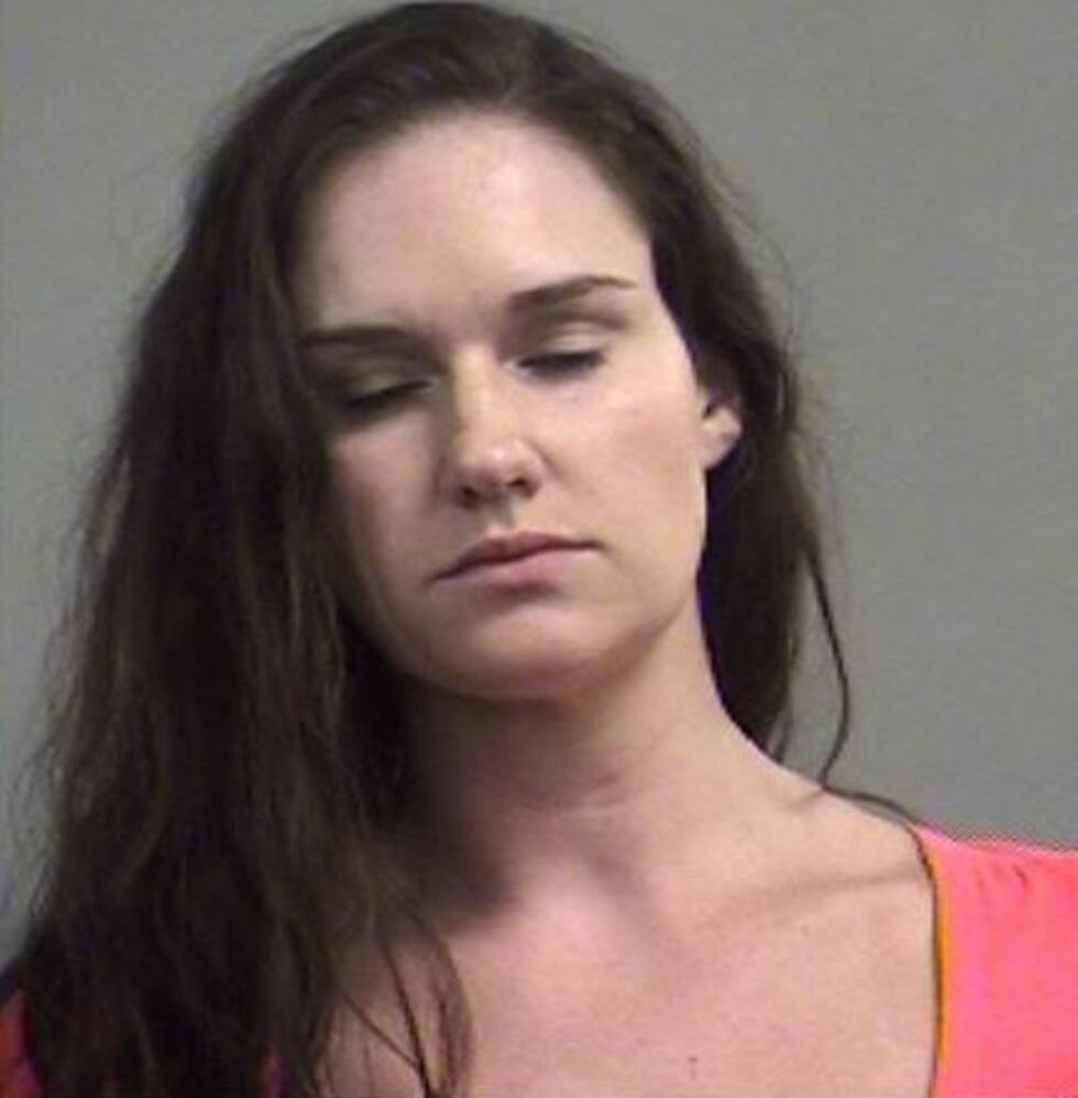 Danielle Rudolph was arrested after police found three children unattended at her home....
