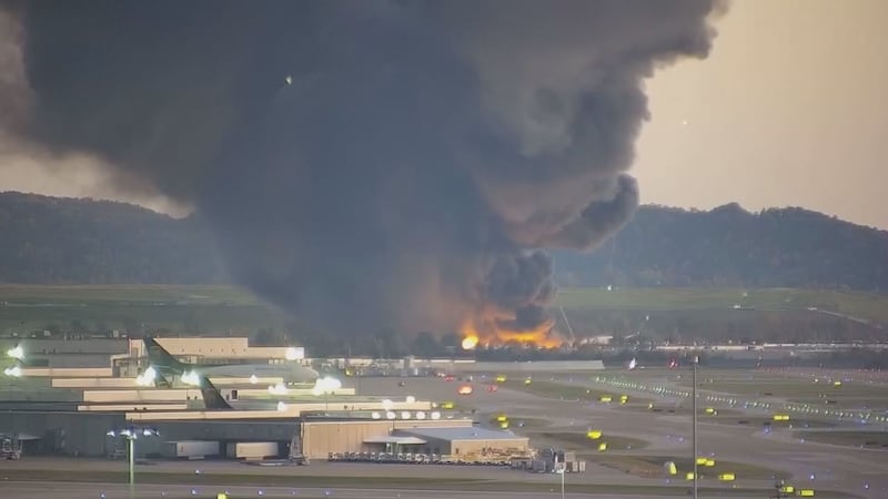 A shot of the crash scene of UPS Flight 2976 following the crash of the MD-11F jet on Nov. 4,...