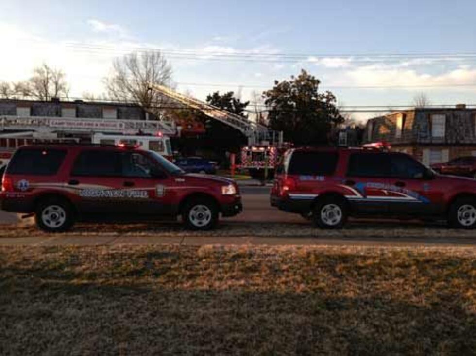 Fire crews outside of the apartment complex.