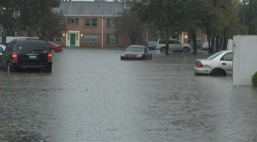 Flood waters in the parking lot of the Guardian Court Apartments on October 6.