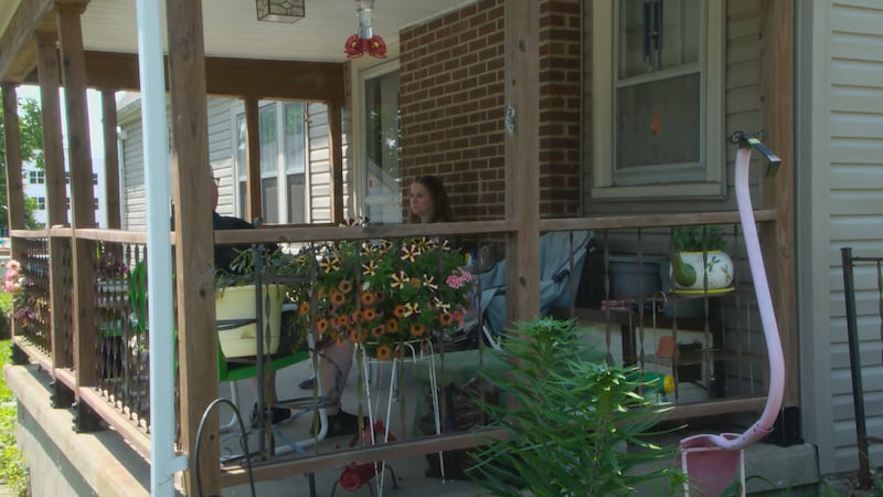 Hodges sits on her porch
