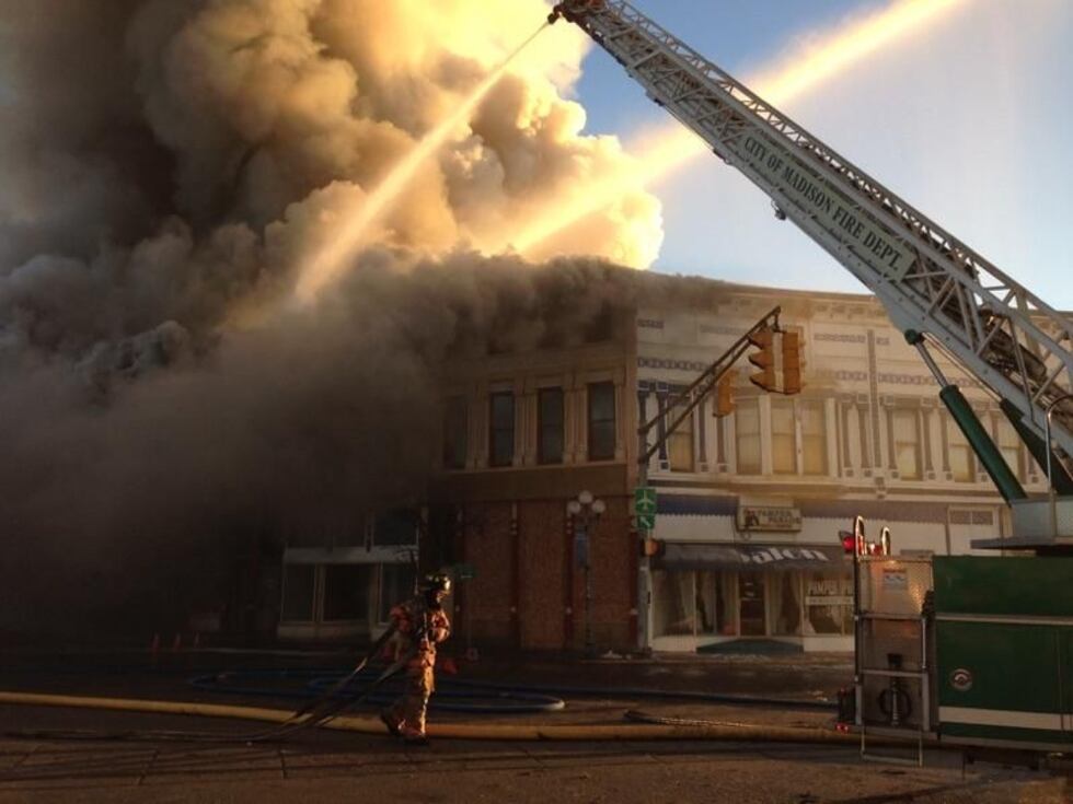 Crews worked throughout the morning to try to put out the fire. (Source: Ron Buchanan)