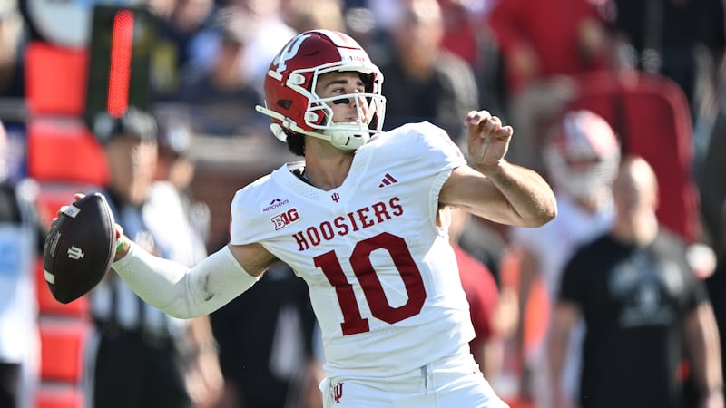 Indiana quarterback Josh Hoover (10) throws a pass in the first quarter of an NCAA college...
