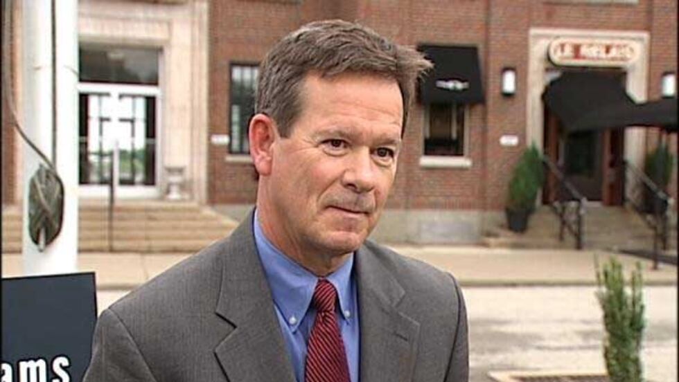 State Sen. Tim Shaughnessy holding a May 16 press conference outside the Bowman Field terminal...