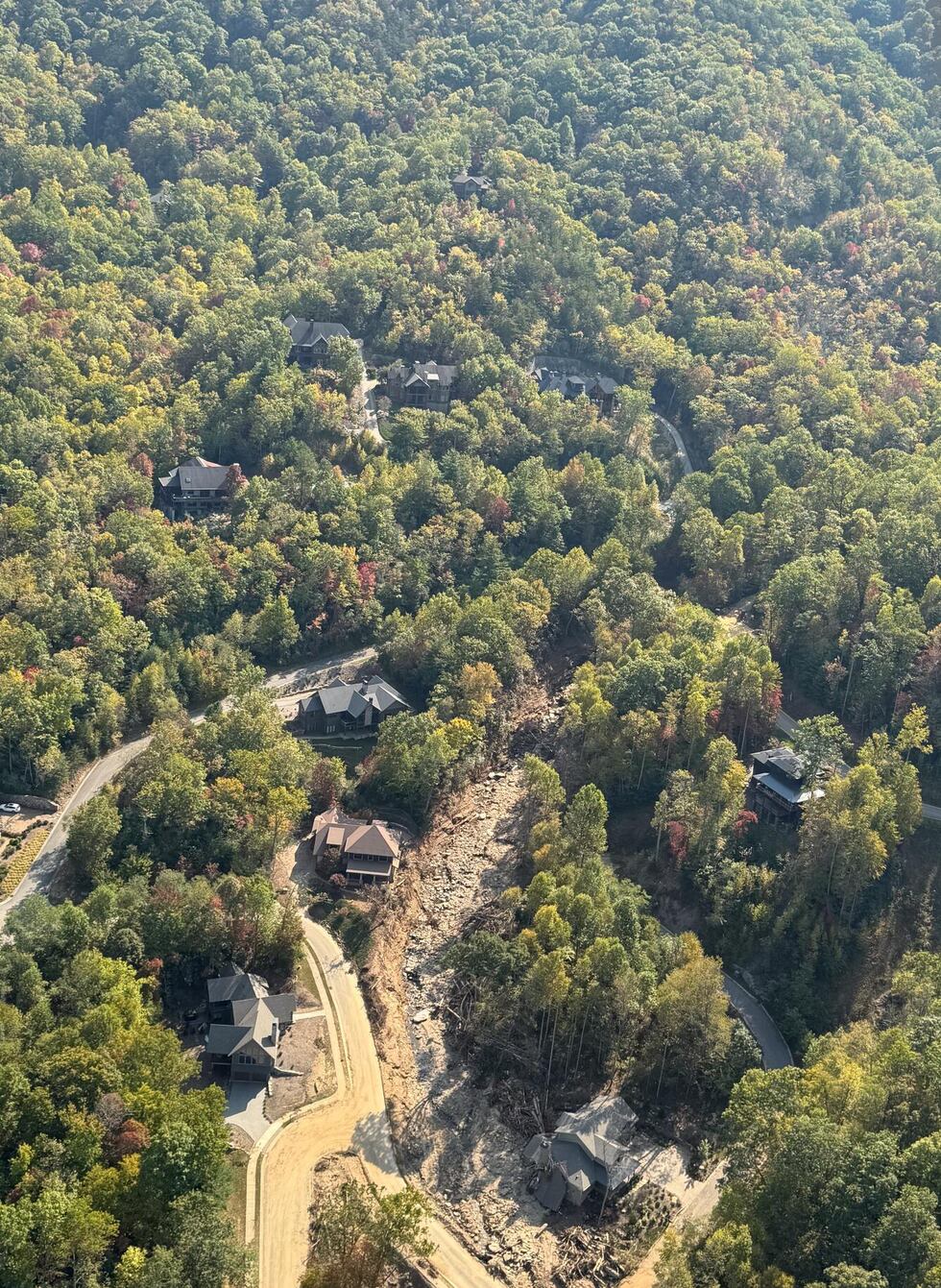 Oblique aerial view of a landslide near Black Mountain, North Carolina triggered by intense...