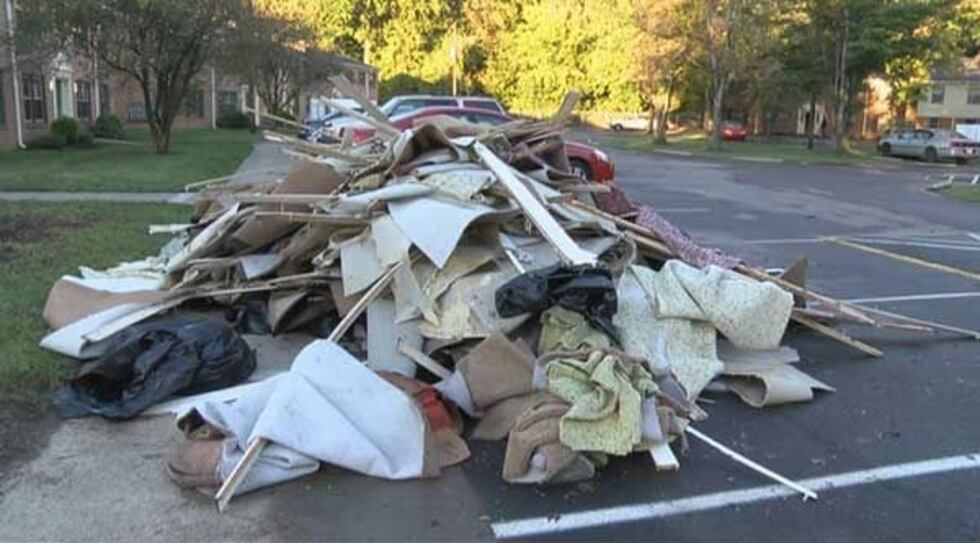 A pile of debris from flood damaged units of the Guardian Court Apartments.
