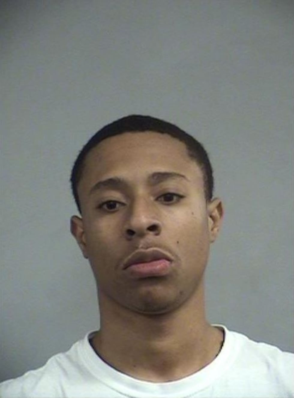 Malik Perry was arrested at Louisville International Airport when TSA said they found 62 fake...