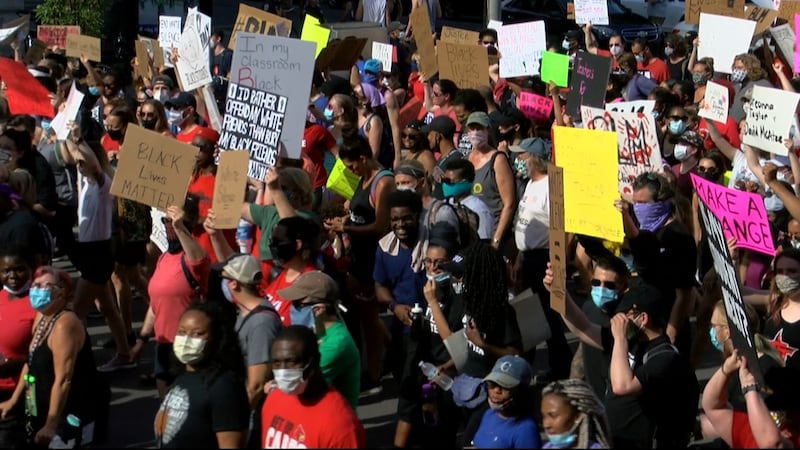 Thousands of people packed downtown Louisville to celebrate the life and protest the death of...