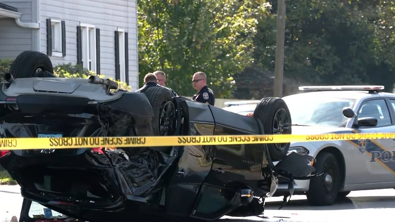 A Louisville Metro Police suspect ran a red light and crashed into another vehicle in the area...