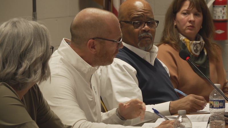 New Albany Housing Authority Executive Director David Duggins addresses his board following a...