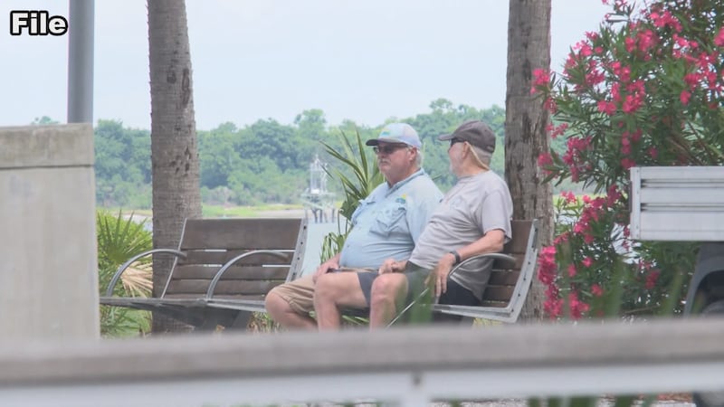 Two men talking.