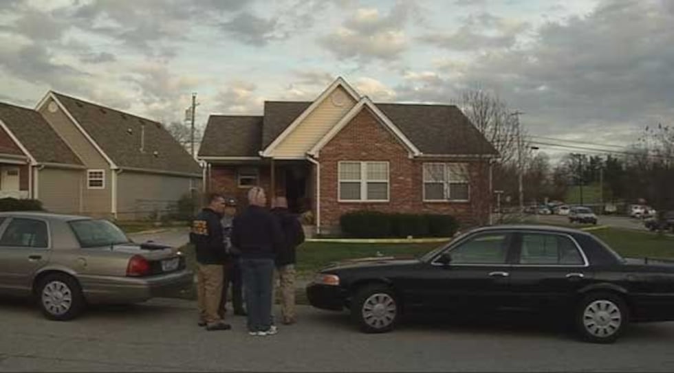 Police outside the home where Trey Williams was shot on Nov. 19, 2011