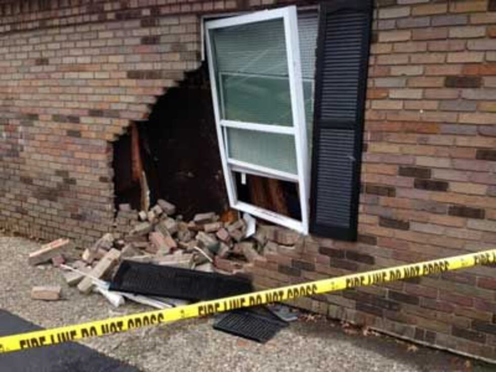 According to MetroSafe, a car hit an apartment complex Wednesday morning.