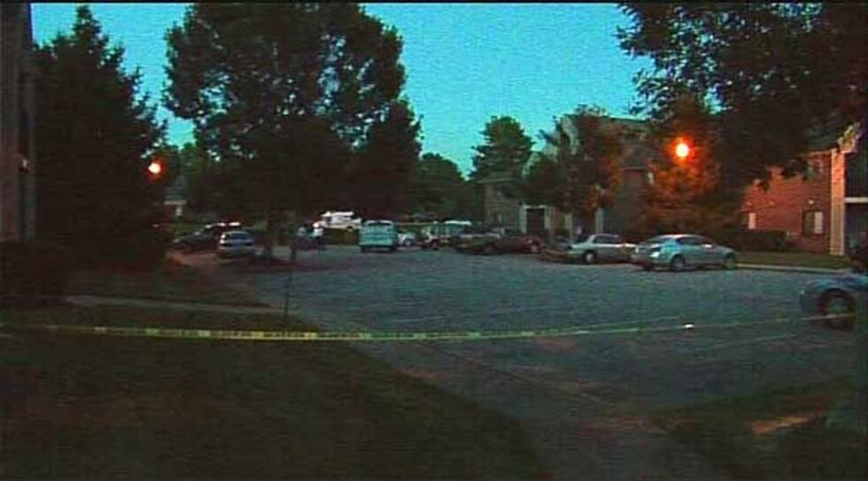 Metro police investigating at the murder scene on July 25, 2013.