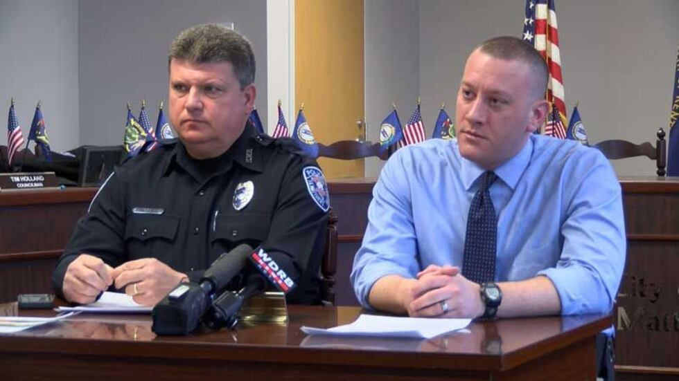 Patrolman Dennis McDonald (left) and Det. Jeff May (right) address the media on Thursday....