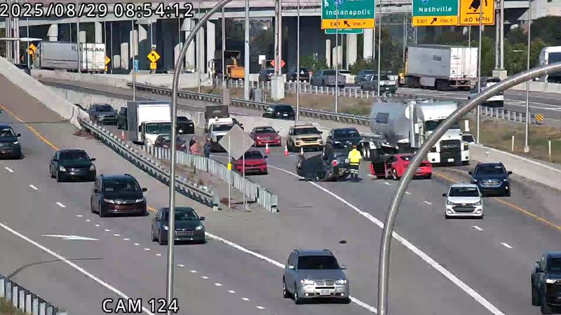 All lanes of traffic are shut down on I-64 East near I-71 as a car has flipped on the road.