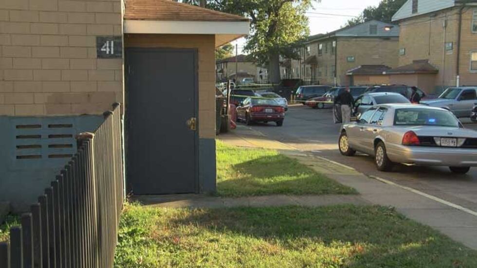 The victims were found between two of the public housing complex buildings. (Source: Michael...