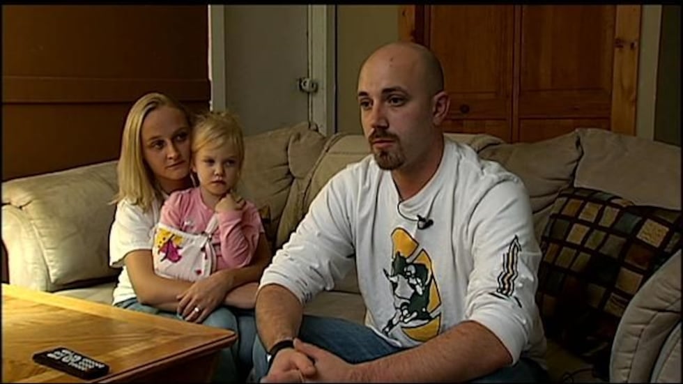 Ryleigh and her parents.
