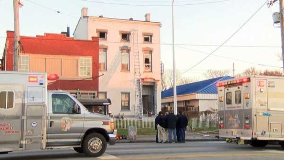 Firefighters used a ladder to rescue a woman froma third floor apartment. (Source: Lee...