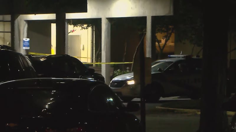 A woman is dead and a man is in the hospital after a shooting and stabbing at an apartment...