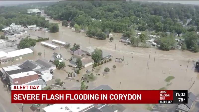 Residents in Lanesville, Ind., are taking shelter on the roofs of their homes Tuesday...