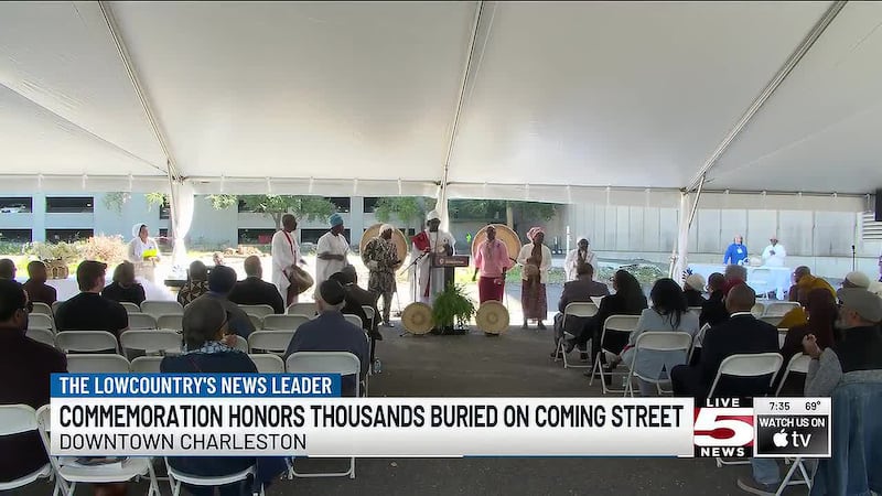 Community members gathered Saturday at 106 Coming St. to honor those buried at the site of a...